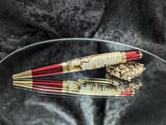Red and gold twist pen  9-11